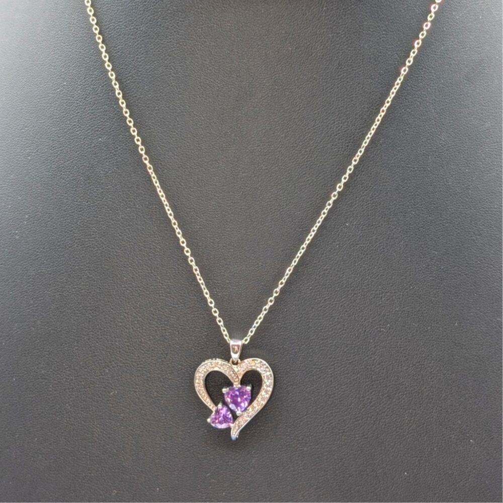 Two Purple Crystal Hearts Within A CZ Studded Heart Silver Tone Pendant Necklace